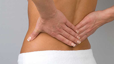 patient needs back pain chiropractor in Huntington, NY