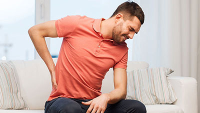 patient needs sciatica chiropractor in Huntington, NY