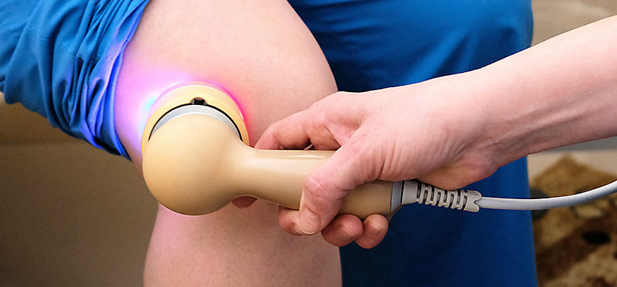 patient receiving cold laser therapy in Huntington