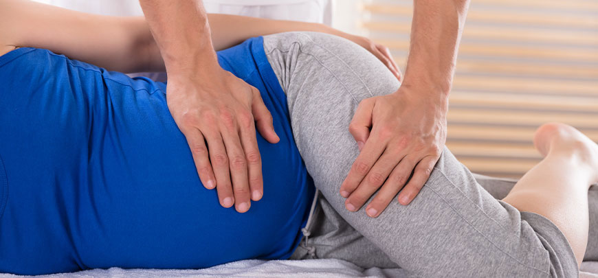 patient receiving prenatal chiropractic in Huntington
