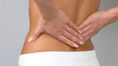 patient requiring back pain treatment in Huntington