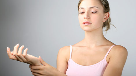 patient requiring carpal tunnel syndrome treatment in Huntington
