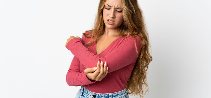 patient needing elbow pain treatment in Huntington