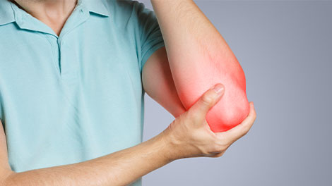 patient requiring golfer's elbow treatment in Huntington