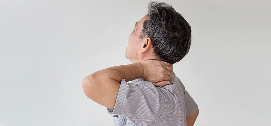 patient needing neck pain treatment in Huntington