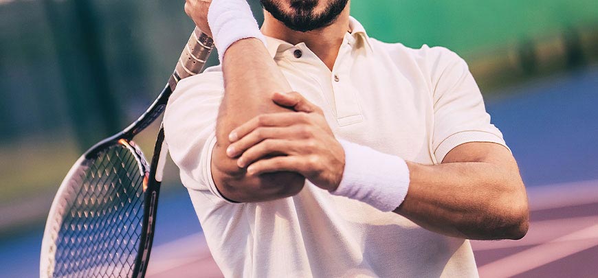 patient needing tennis elbow treatment in Huntington