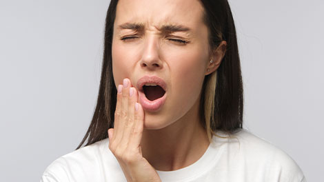 patient requiring jaw pain treatment in Huntington